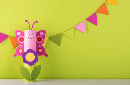 butterfly made of paper. the toys are made from a roll of toilet paper. eco-friendly product. recyclingの写真素材