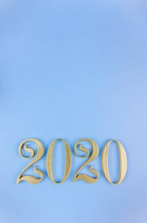 New Year 2020. Golden numbers on a blue background. Copy spaceの写真素材