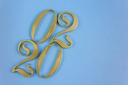 New Year 2020. Golden numbers on a blue background. Copy spaceの写真素材