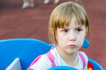 Little girl made a funny face. outdoor