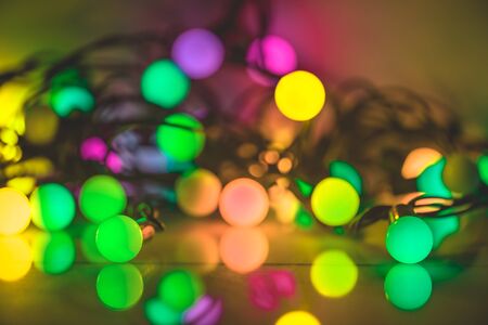 Christmas. New Year's Eve. multicolored garland. Background Holiday Horisontal
