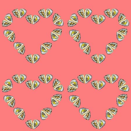 Pattern. rolls in the form of a heart on a pink background