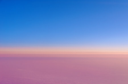 beautiful pink clouds at sunset and blue sky