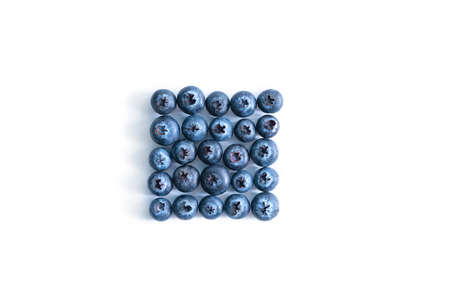 blue blueberry in the shape of a square on a white backgroundの写真素材