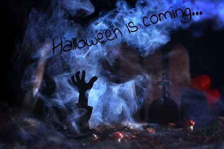 Halloween theme. hand from the ground in the cemeteryの写真素材