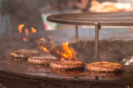 meat cutlets are cooked on an open fire. barbecueの写真素材