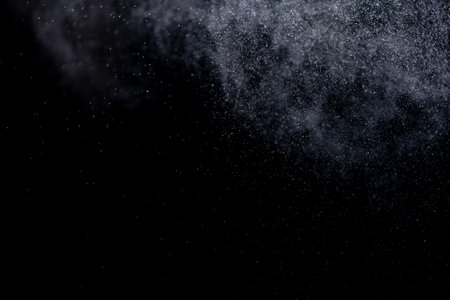 small drops of rain, snow on a black background. wind. Natural backgroundの写真素材