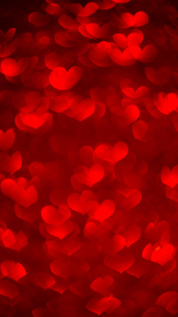 red background with highlights, sparkles. Beautiful holiday background, background for postcards, with copy spaceの写真素材
