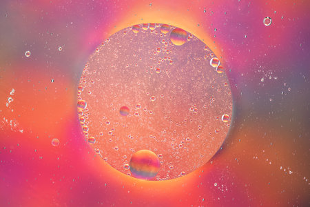 Abstract colorful background with oil on water surface. Oil drops in water abstract psychedelic....