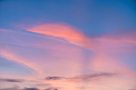 pink clouds at sunset, sunrise, magical, fantasy natural background, celestial landscapeの写真素材