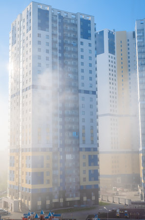 heavy fog in the city, modern high-rise buildings in the fogの写真素材