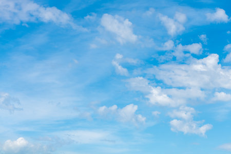 beautiful cumulus clouds in blue sky, natural background, wallpaperの写真素材