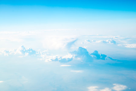 view of beautiful white clouds in the sky, natural background, view from plane, top view