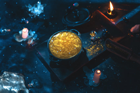 Alchemy, astronomy, astrology, a magic potion in a pot. mysticism, mysteriousの写真素材