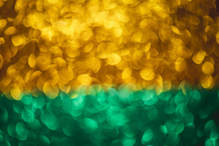 Shiny golden and green glitter luxury background, blurry sparkling lights texture, perfect for backgrounds, textiles, wallpapersの写真素材