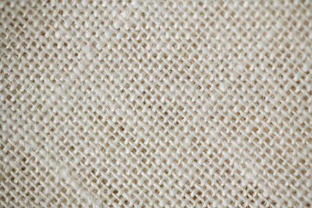 Close up background, bright delicate pink fabric texture, thread weave, textile texture, perfect for backgrounds, textiles, wallpapersの写真素材