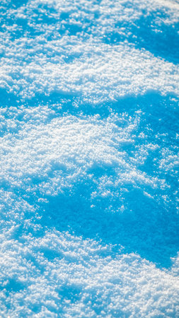 Natural snow background, snow glitters and shimmers like a rainbow in the sun, natural snow textureの写真素材