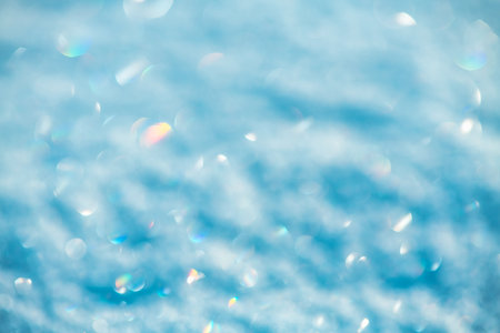 Natural snow background, snow glitters and shimmers like a rainbow in the sun, natural snow textureの写真素材