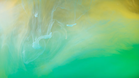 clouds of yellow and green smoke, clouds of paint in water, aquarium, abstract background, textureの写真素材