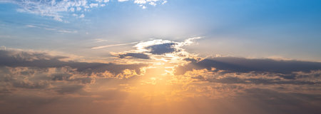 Beautiful sunset or sunrise, sky with clouds, sun rays breaking through the clouds, magical,...