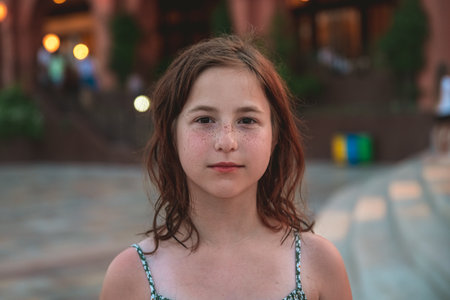 Portrait of a cute red-haired girl teen with frecklesの写真素材