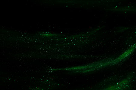 abstract green speed camera motion background over glowing lights with sparkles, stars. A pattern of flashes of light similar to the Northern Lights. for overlayの写真素材