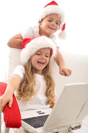 Writing a letter to santa is not what it used to be - computer generation kids emailing their christmas wishesの写真素材