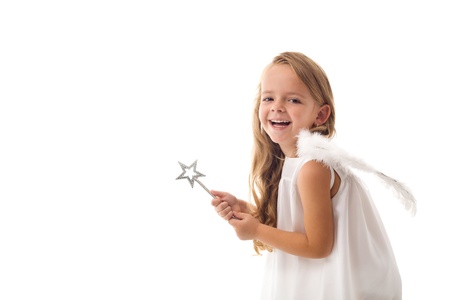 Little fairy angel with magic wand laughing - isolated with copy spaceの写真素材