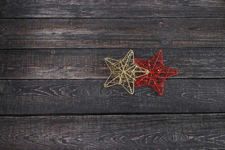 two stars closeup on wooden background new year, Christmas!の写真素材