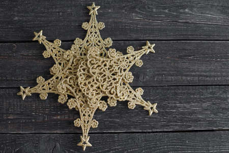 star closeup on wooden background new year, Christmas!の写真素材