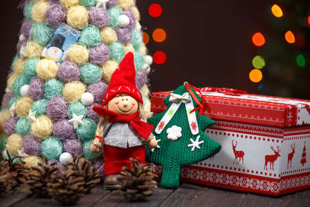 Christmas background with Christmas tree on wooden table.