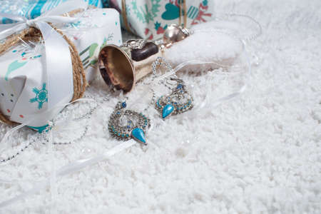 Various Christmas presents in home white blue