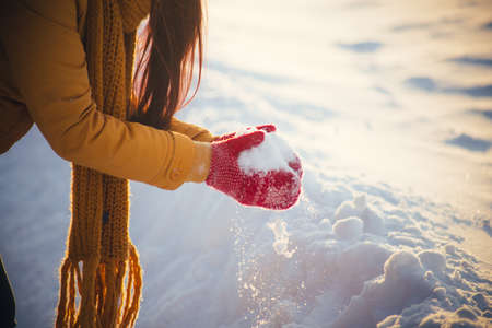 Portrait of romantic girl at sunset, sunrise, gold per hour on a frosty winter day,eveningの写真素材