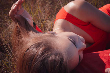 the loving couple walks on the wheat field, love storyの写真素材