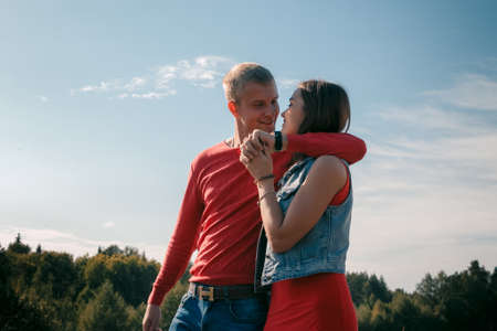 the loving couple walks on the wheat field, love storyの写真素材