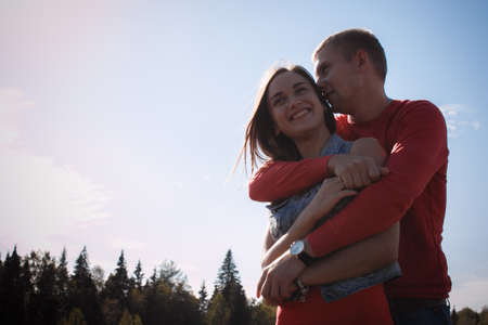 the loving couple walks on the wheat field, love storyの写真素材