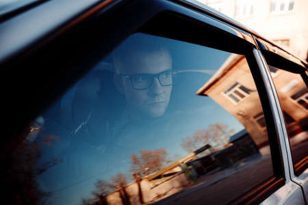 will rub the driver of the car through  glass