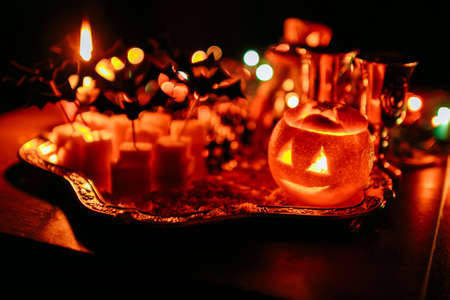 trick or treat, halloween tradition: entertainment by a holiday in the form of a canape, bats and the pumpkin headの写真素材