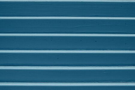 Blue horizontal corrugated wooden panel texture. Place for your design.の写真素材
