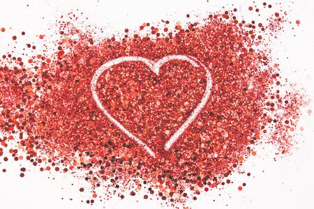 Beautiful drawing a heart on a glitters background. Love concept.の写真素材