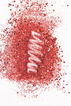 Zig-zag line on a red glitter background.の写真素材