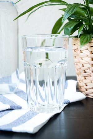 A glass of water with a blurred background. Top view. Fresh image.の写真素材