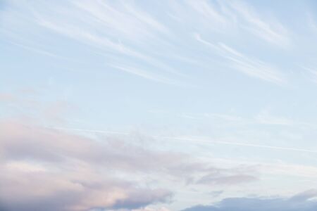 Blue sky with clouds background with soft focus. Spring backgorund. Empty background.の写真素材