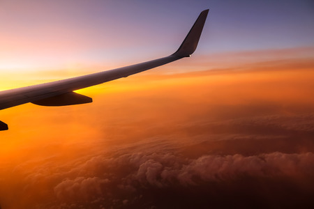 Sunrise from airplaneの写真素材