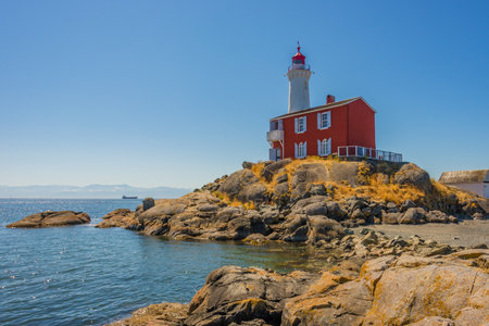 Lighthouse on the rocky coast, Canada.の写真素材