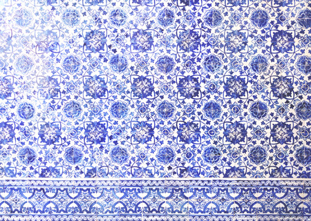 Mosaic tiles, Portugal Azulejo Classic and Traditional. Blue Patterned wall, medieval ceramics tile, heritage. Painted panel with a round geometric pattern. Mauritanian Wallpeper from Lisbon cityの写真素材