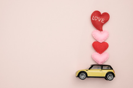 Toy car carrying heart-shape, Concept of valentine day, AF point selection.の写真素材