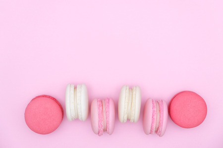macarons on pink background, Beautiful dessert, Flat lay style with copy space to write.の写真素材