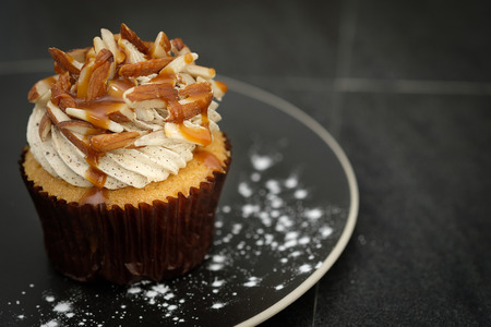 Cupcakes are beautifully decorated in Dark lighting, AF point selection.の写真素材