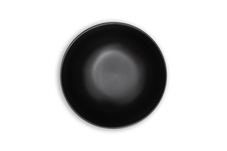 Top view-Empty black ceramic round dish plate isolated on white background.の写真素材